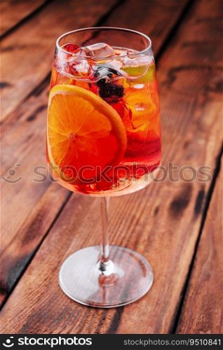 Delicious sangria cocktail on wooden table
