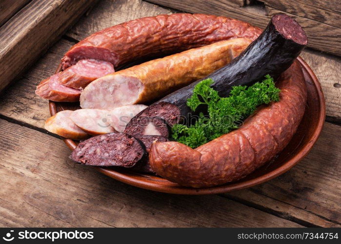 Delicious sausages.Set of smoked meats and sausages. Smoked meats and sausages