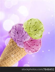 Delicious scoops of Ice cream in the cone with abstract light background.. Ice Cream cone