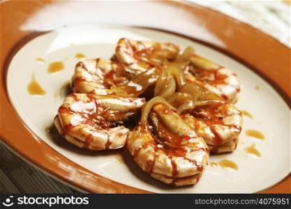 Delicious shrimps cooked with onion and worcestershire sauce