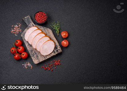 Delicious smoked chicken sausage with salt, spices and herbs on a dark concrete background