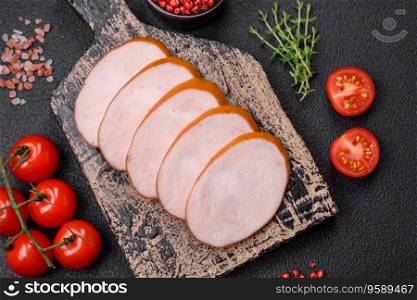 Delicious smoked chicken sausage with salt, spices and herbs on a dark concrete background