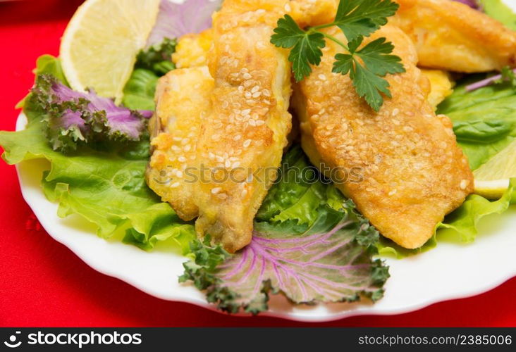 Delicious spiced catfish escalope in sesame