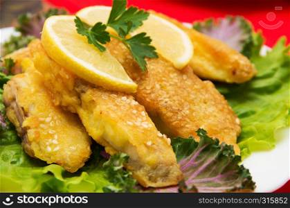 Delicious spiced catfish escalope in sesame