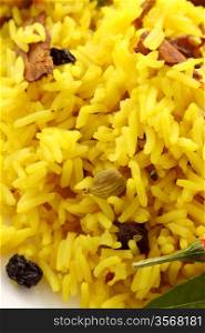 Delicious spicy rice with tumeric, chilli, cardamon and curry leaf.