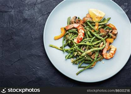 Delicious spicy salad with shrimps and cowpea. Seafood salad. Green shrimp salad.