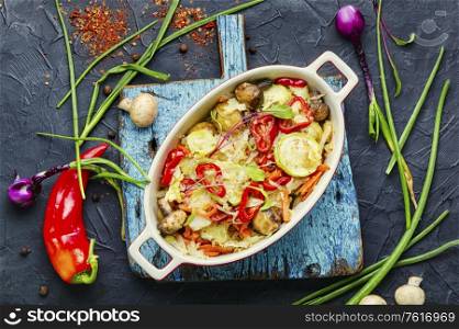 Delicious stewed vegetables,healthy vegetarian food.Healthy and vegan eating. Vegetable saute in baking dish