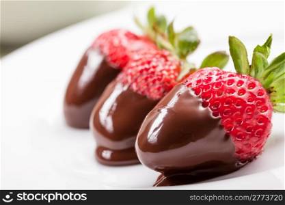delicious strawberries with melted chocolate