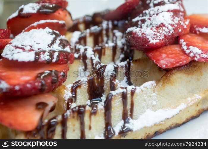 Delicious Strawberry and Chocolate Drizzled Belgium Waffle