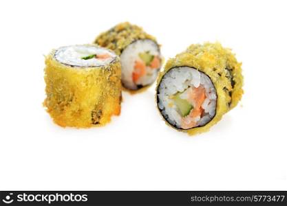 Delicious sushi rolls on white background