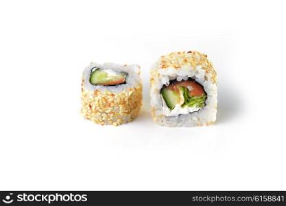 Delicious sushi rolls on white background