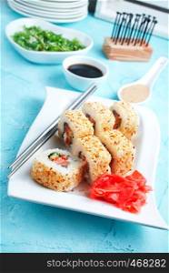 Delicious sushi rolls with rice, chuka and sauce