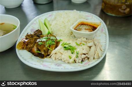 delicious Thai food call KHAO MUN KAI from chickren and spicy juice