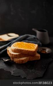 Delicious toasts with sweet jams on wooden background. . Delicious toasts with sweet jams. 