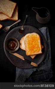 Delicious toasts with sweet jams on wooden background. . Delicious toasts with sweet jams. 