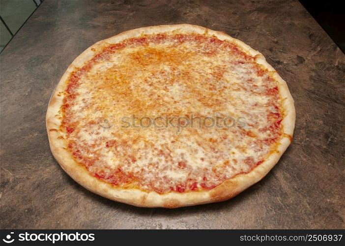 Delicious tomato sauce cheese covered hot and tasty pizza pie . Pizza and Beer