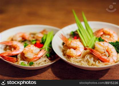 Delicious traditional bowl of shrimp with tasty noddle
