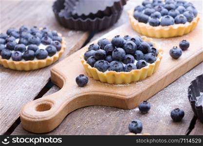 Delicious, useful and beautiful tartlets with blueberry