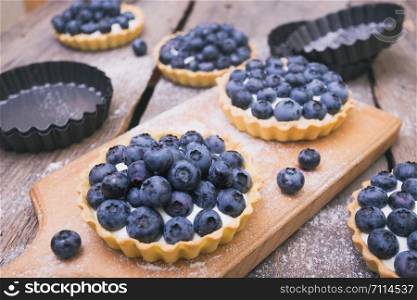Delicious, useful and beautiful tartlets with blueberry