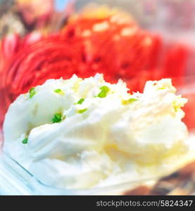 Delicious white vanilla and red watermelon ice cream gelato in a box