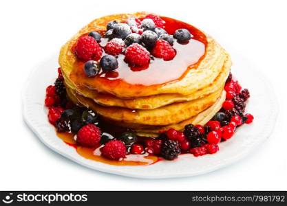 deliciuos pancake with fresh fruit on white