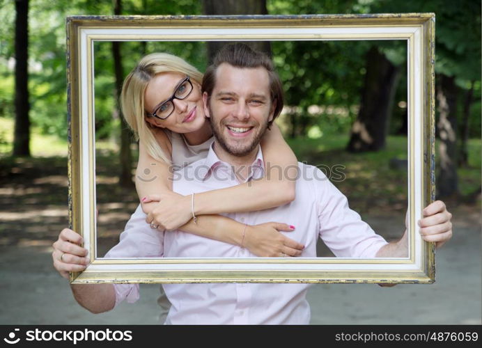 Delighted married couple taking the conceptual photo