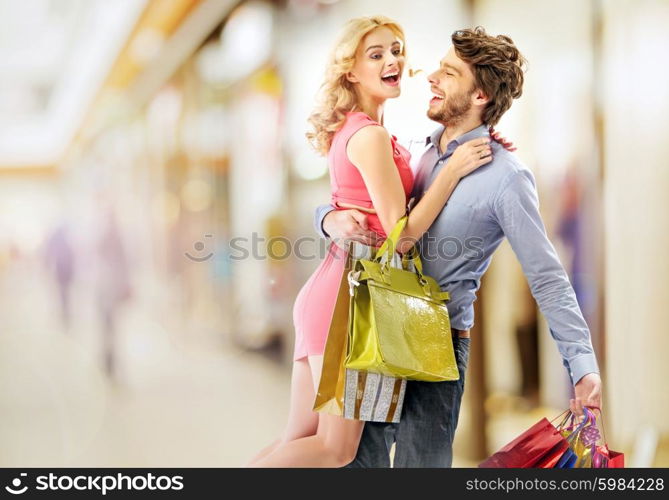 Delighted young couple haunting for the occasions