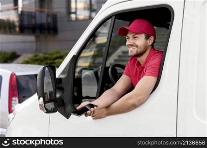 delivery man car with mobile