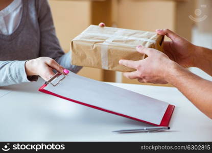 Delivery man delivering parcel box