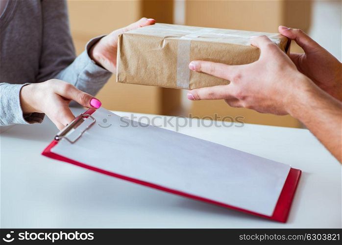 Delivery man delivering parcel box