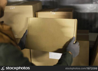 delivery man with packages. High resolution photo. delivery man with packages. High quality photo