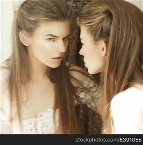 Delusion. Image of Beautiful Woman in Front of a Mirror