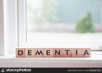 Dementia sign in a window in a bright room