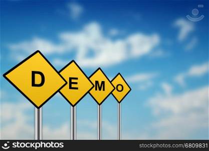 demo on yellow road sign with blurred sky background