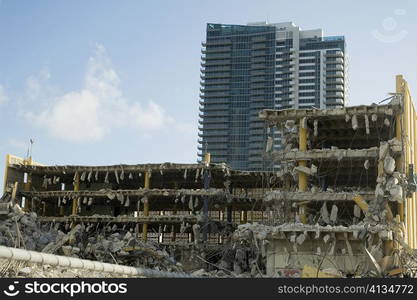 Demolished building in front of another building