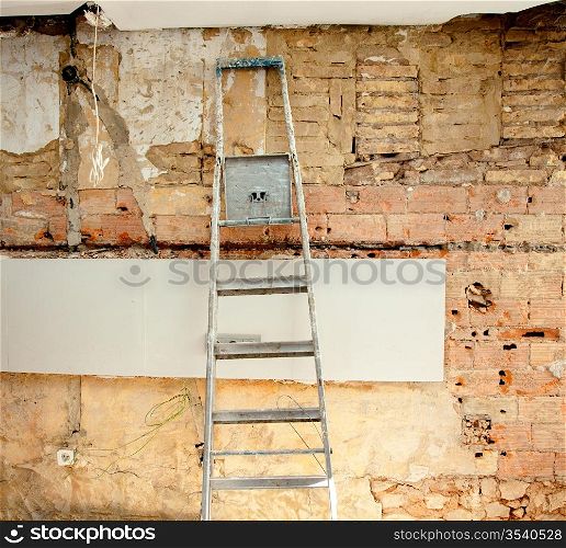 demolition debris in kitchen interior construction and ladder