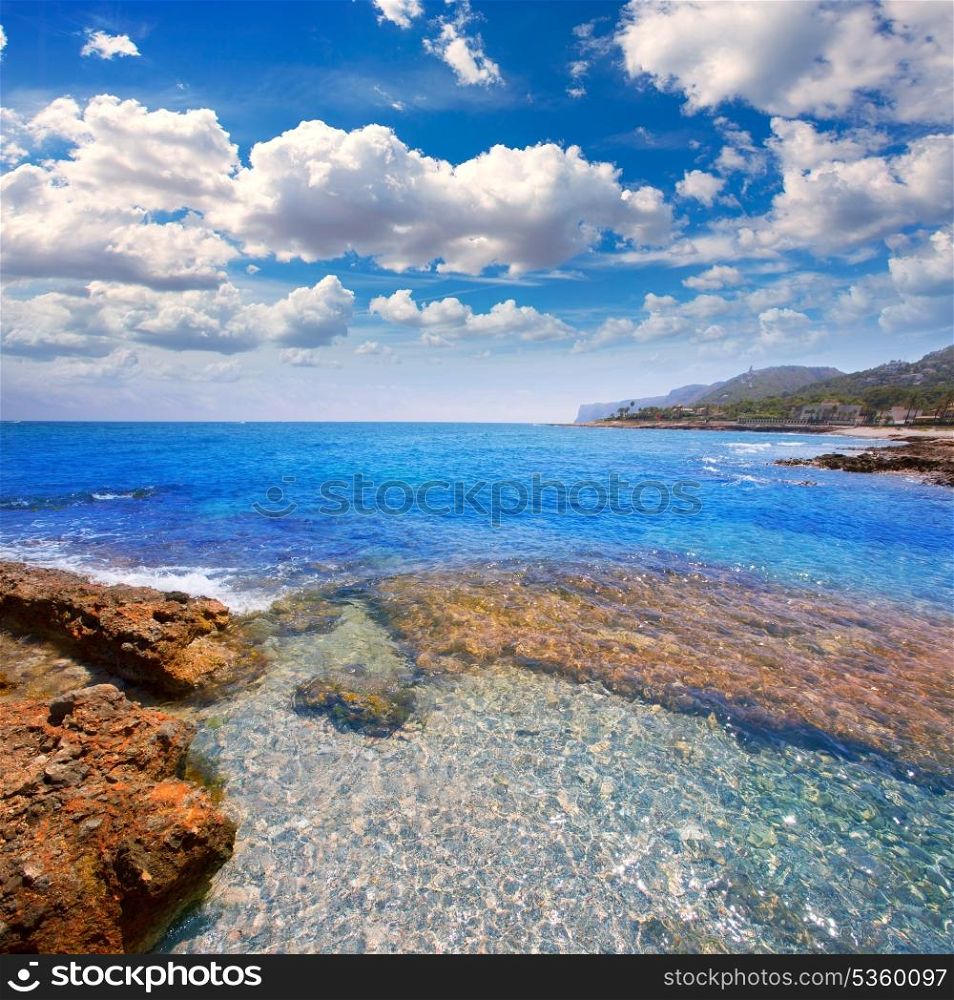 Denia Alicante Las rotas rocky beach in Spain and San Antonio Cape ...