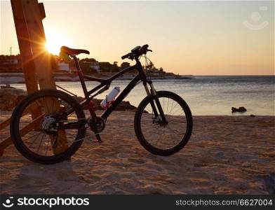 Denia beach las Rotas with bicycle bike in  Alicante of Spain