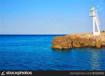 Denia Las Rotas Trampoli beach and tower in Mediterranean Spain Alicante