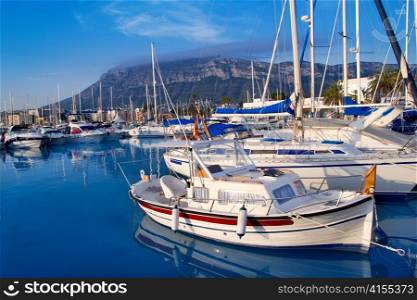Denia marina port boats and Mongo mountain in Alicante Spain