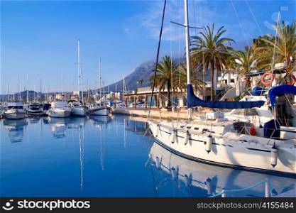 Denia marina port boats and Mongo mountain in Alicante Spain