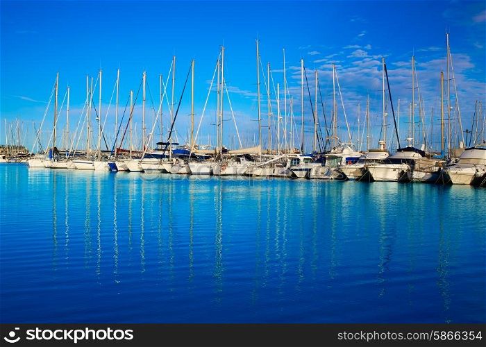 Denia marina port in Alicante Spain with boats in a sunny blue day