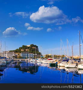 Denia Port with castle hill and marina boats in Alicante province Spain