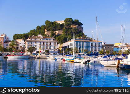 Denia Port with castle hill and marina boats in Alicante province Spain