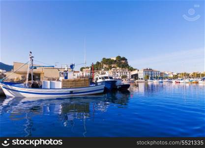 Denia Port with castle hill fisherboats in Alicante province Spain