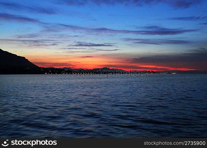 Denia sunset view from sea Mediterranean backlight Alicante Spain