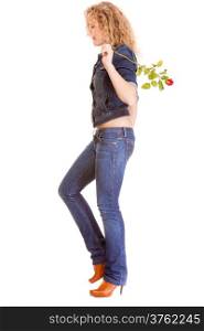 Denim fashion. Full length blonde girl casual young woman in stylish blue jeans pants and jacket high heels holding red rose isolated on white background