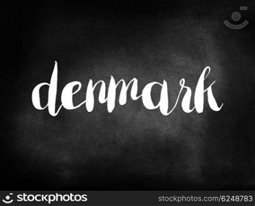 Denmark written on a blackboard
