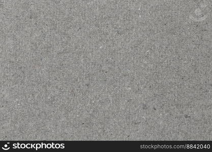 Dense cardboard paper closeup texture or background