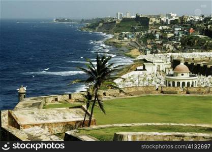 Dense habitation line up the coastline, El Morro Fort, San Juan, Puerto Rico